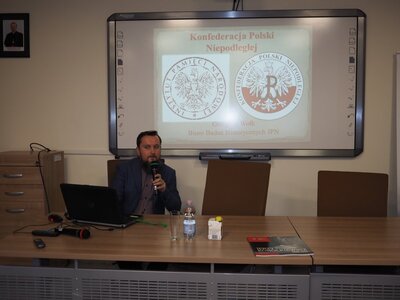 Grzegorz Wołk podczas wykładu